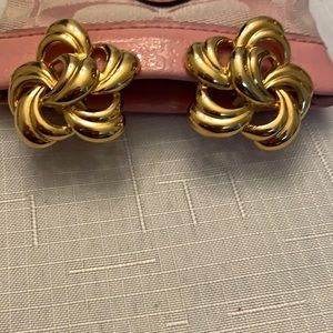 - gold coloured earrings